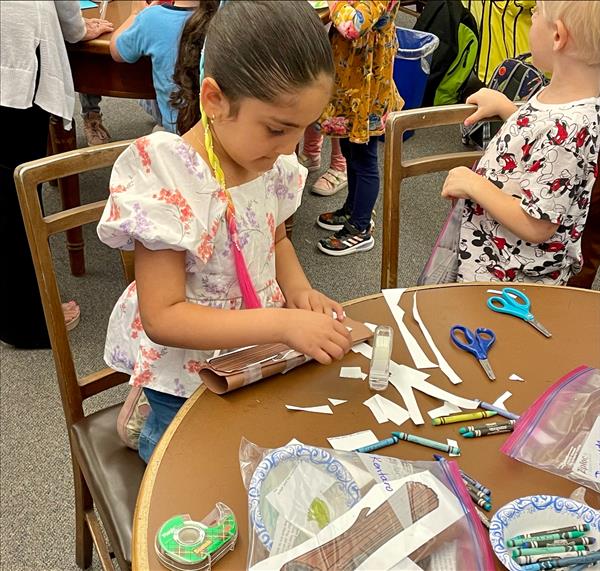 Enjoying a small group activity at the library.